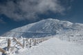 Fenced path to SnÃâºÃÂ¾ka mountain, the highest mountain in Czech republic in KrkonoÃÂ¡e range